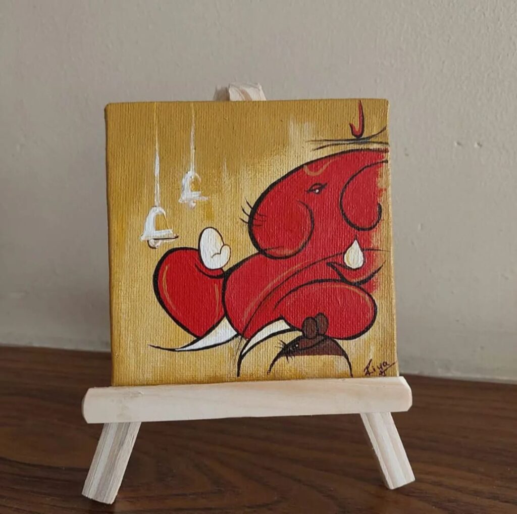 Gifting table decor Ganesha painting-https://thecanvaswall.com/