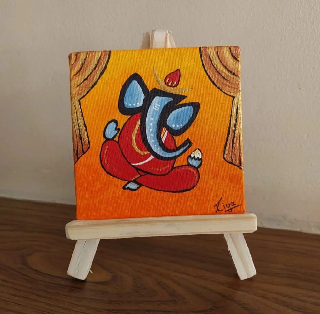 Gifting table decor Ganesha painting-https://thecanvaswall.com/